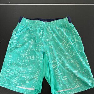 Lululemon shorts, green with white print M